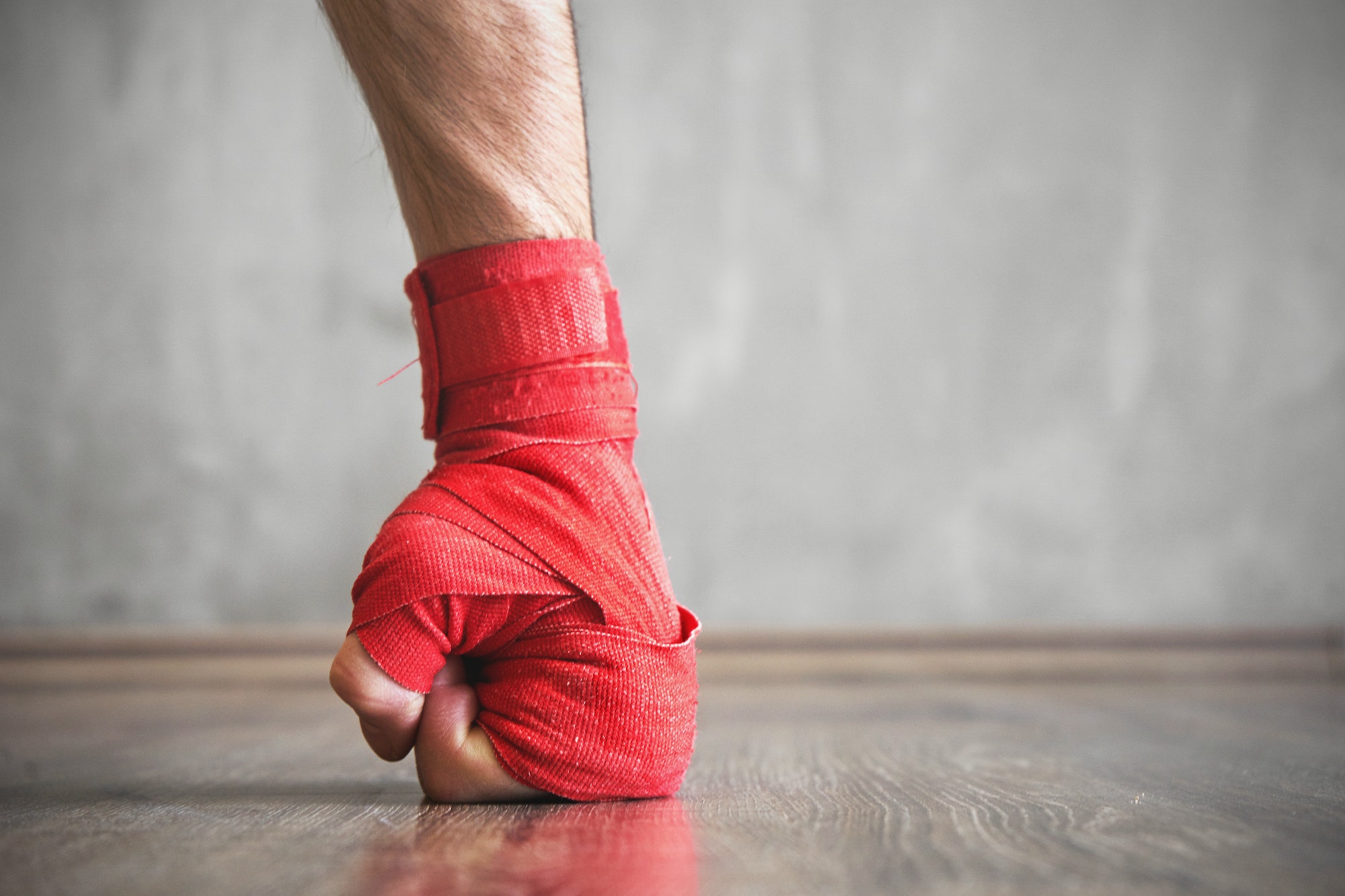 Close up shot of a muscular boxer doing push-ups