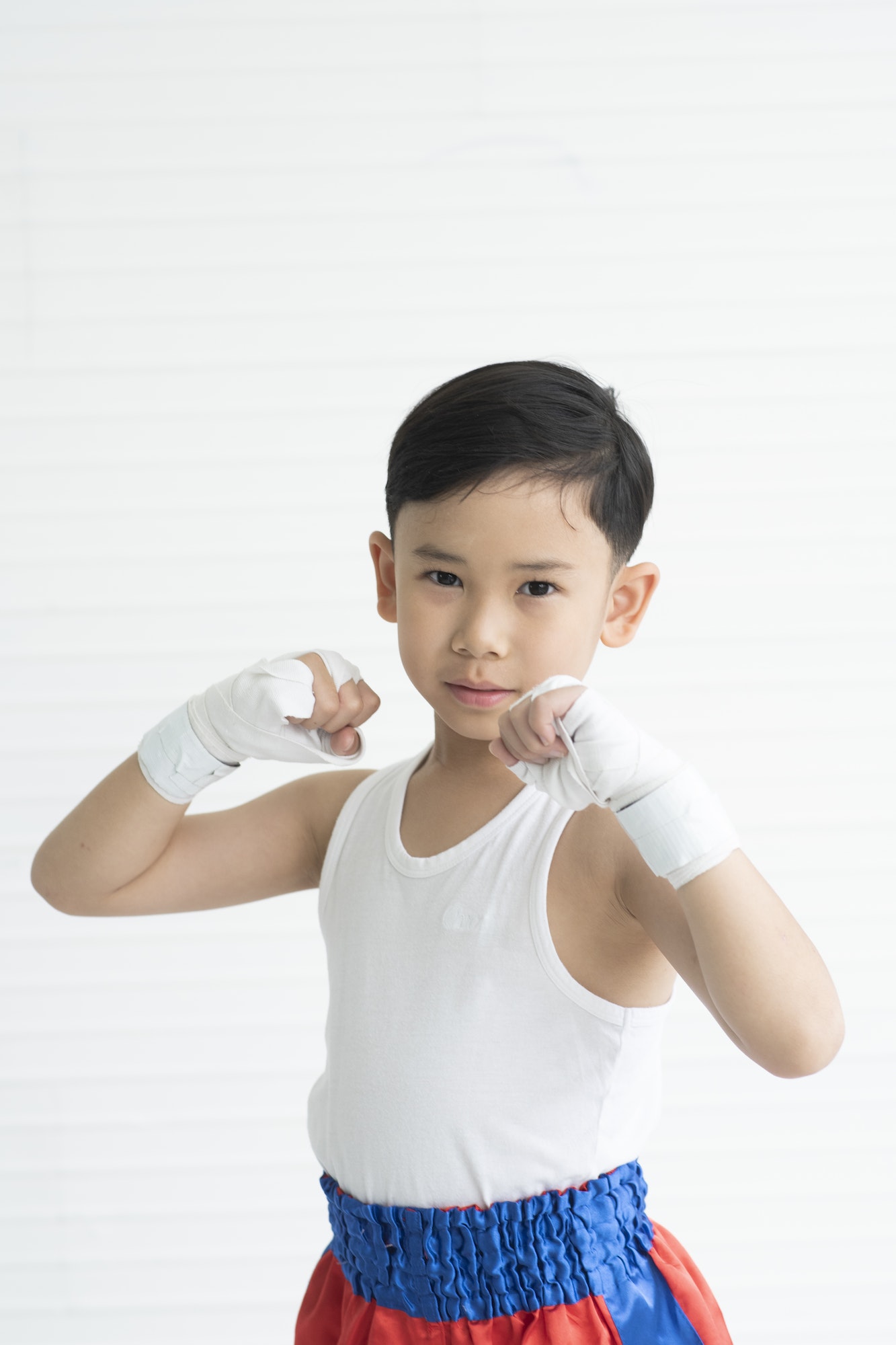 Boys are learning Muay Thai sports.